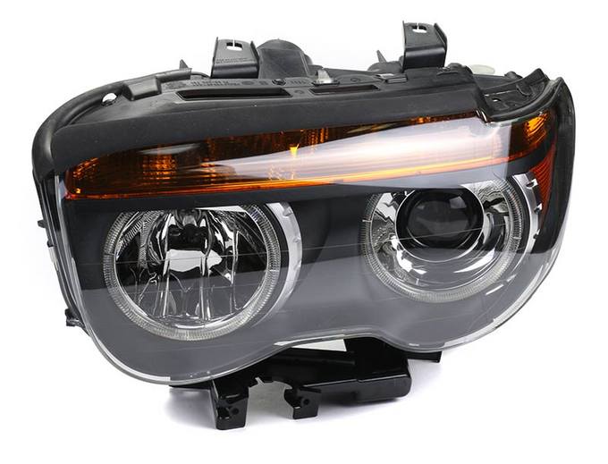 BMW Headlight Assembly - Driver Side (Xenon) 63127165449 - Hella 158079006